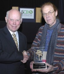 J. Michael Scott presents Jeremy Jackson with the LaRoe Award in 2007